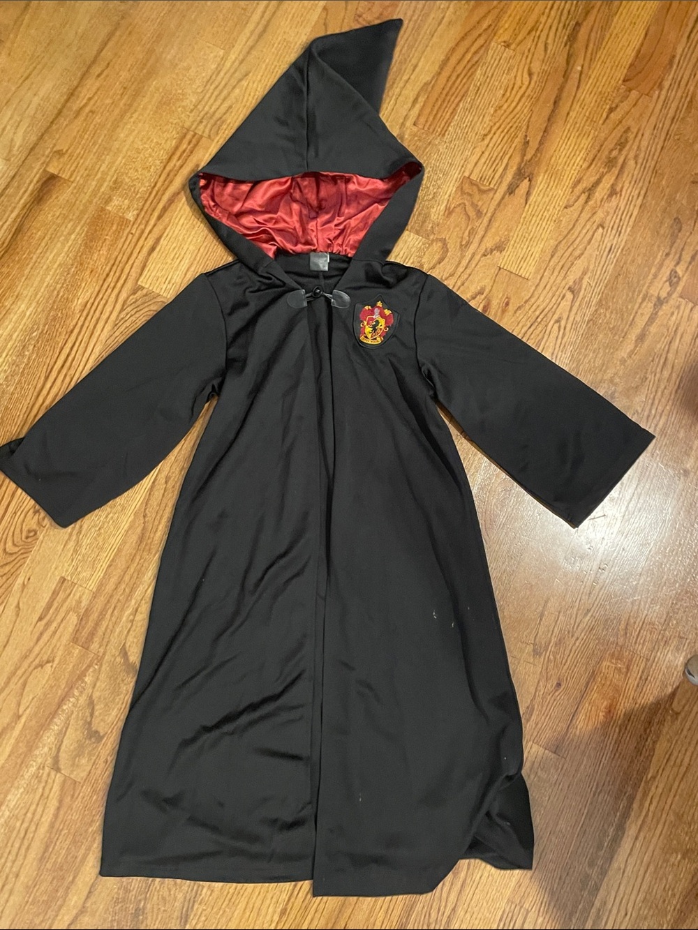 Harry Potter Spirit Black Hooded Coat with Red Lining and Gryffindor Crest youth